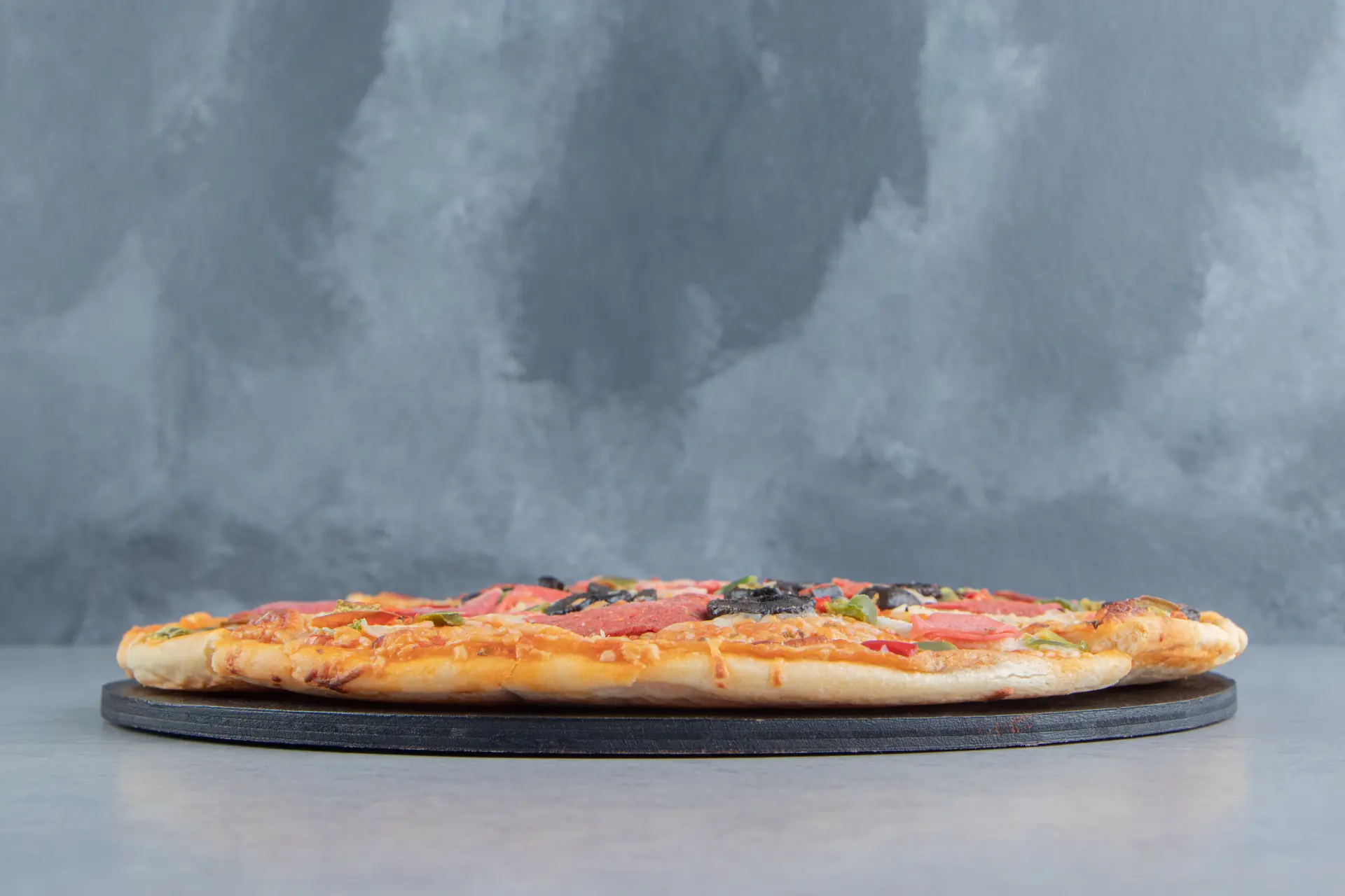 frozen pizza on pizza stone